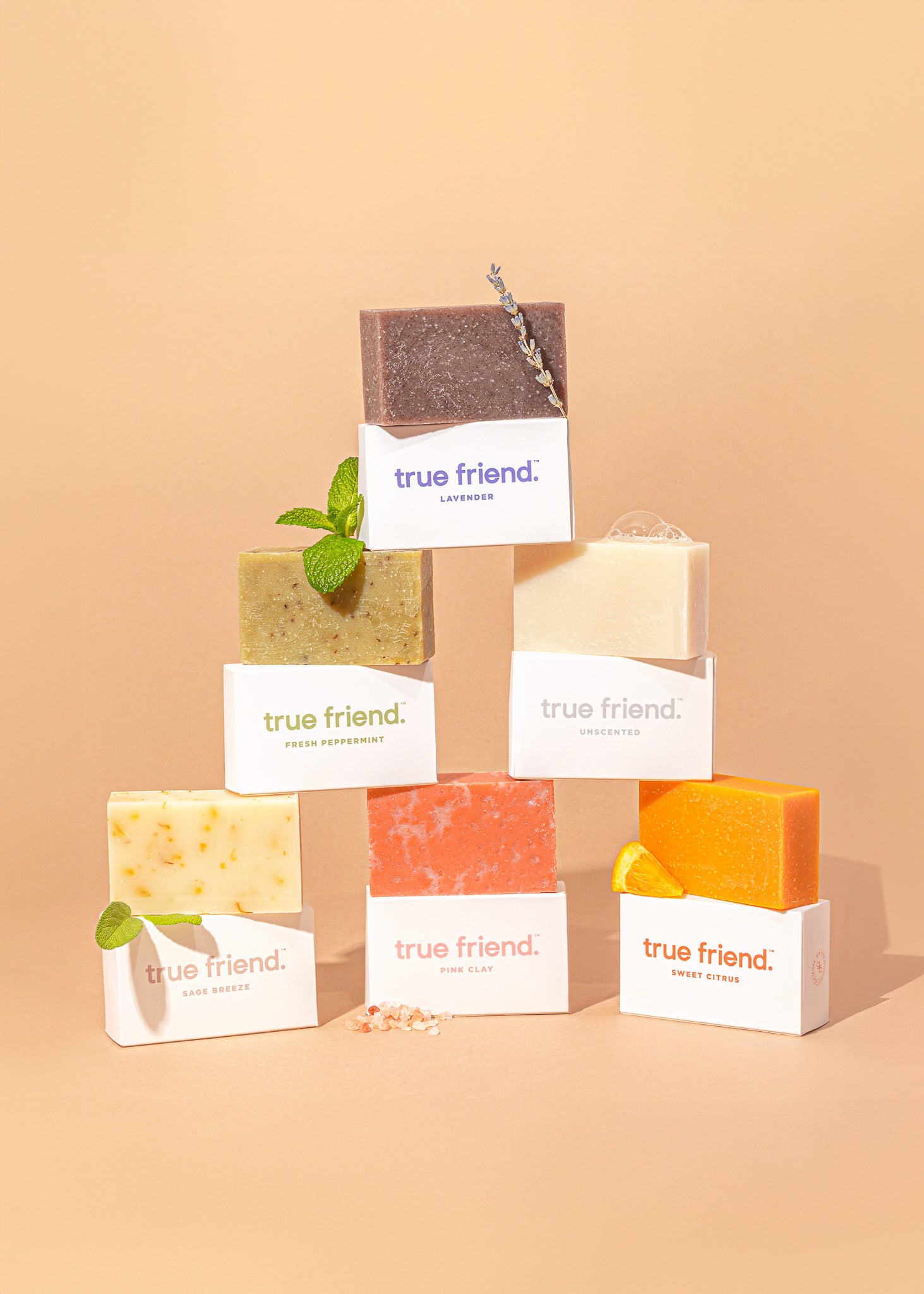 True Friend organic soap bar collection. Six total soap bars in the scents of: lavender, peppermint, unscented, sage breeze, pink clay, and citrus