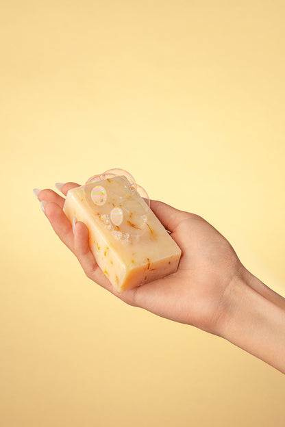hand holding True Friend sage breeze soap bar